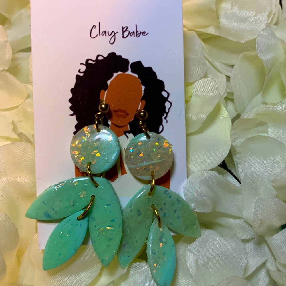 Beautiful light weight clay earrings with a hint of sparkle.